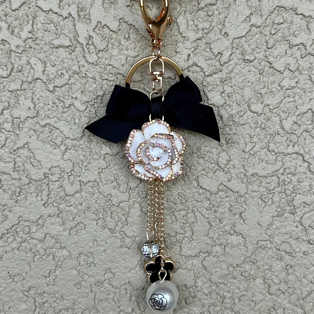 Luxe White Floral Keychain/Bag Charm with Black Bow